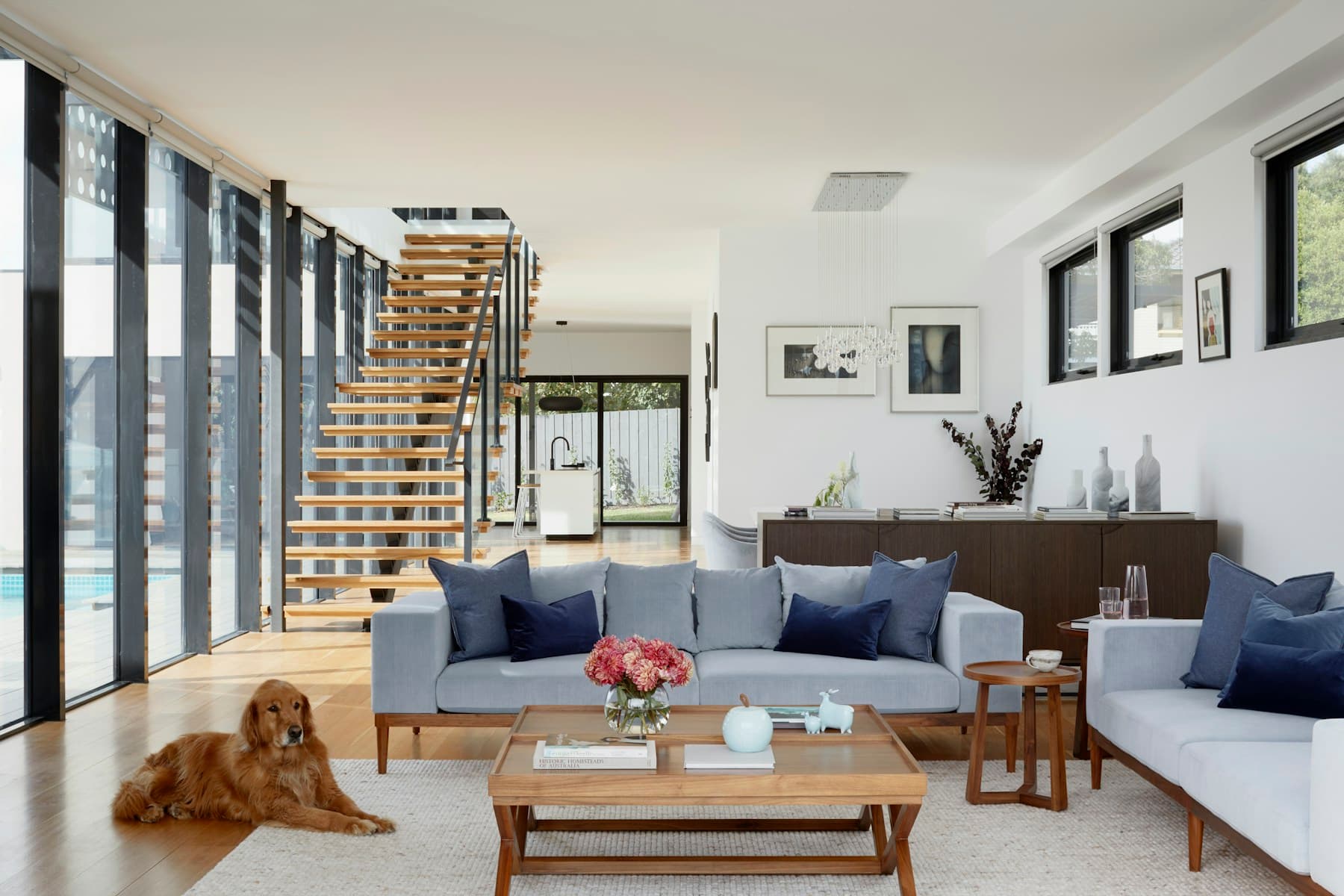 Sophisticated outdoor living with stone, plants, and natural light