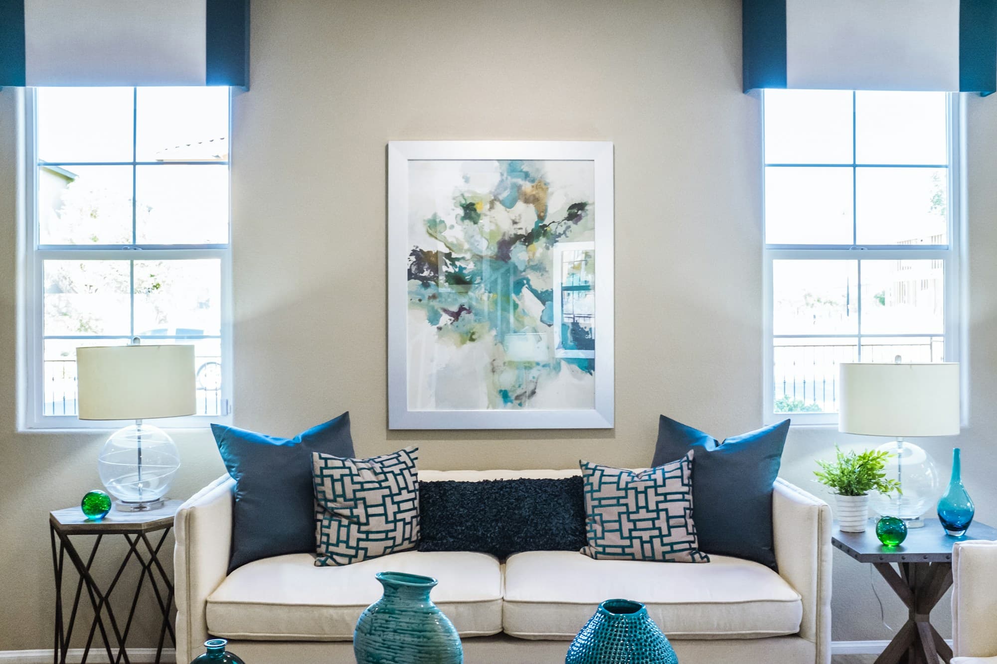 Bright living room with seasonal light, art, and considered furnishings